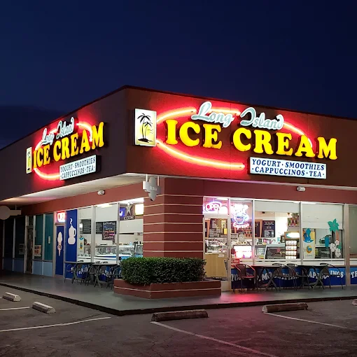 Long Island Ice Cream storefront glowing with neon at night